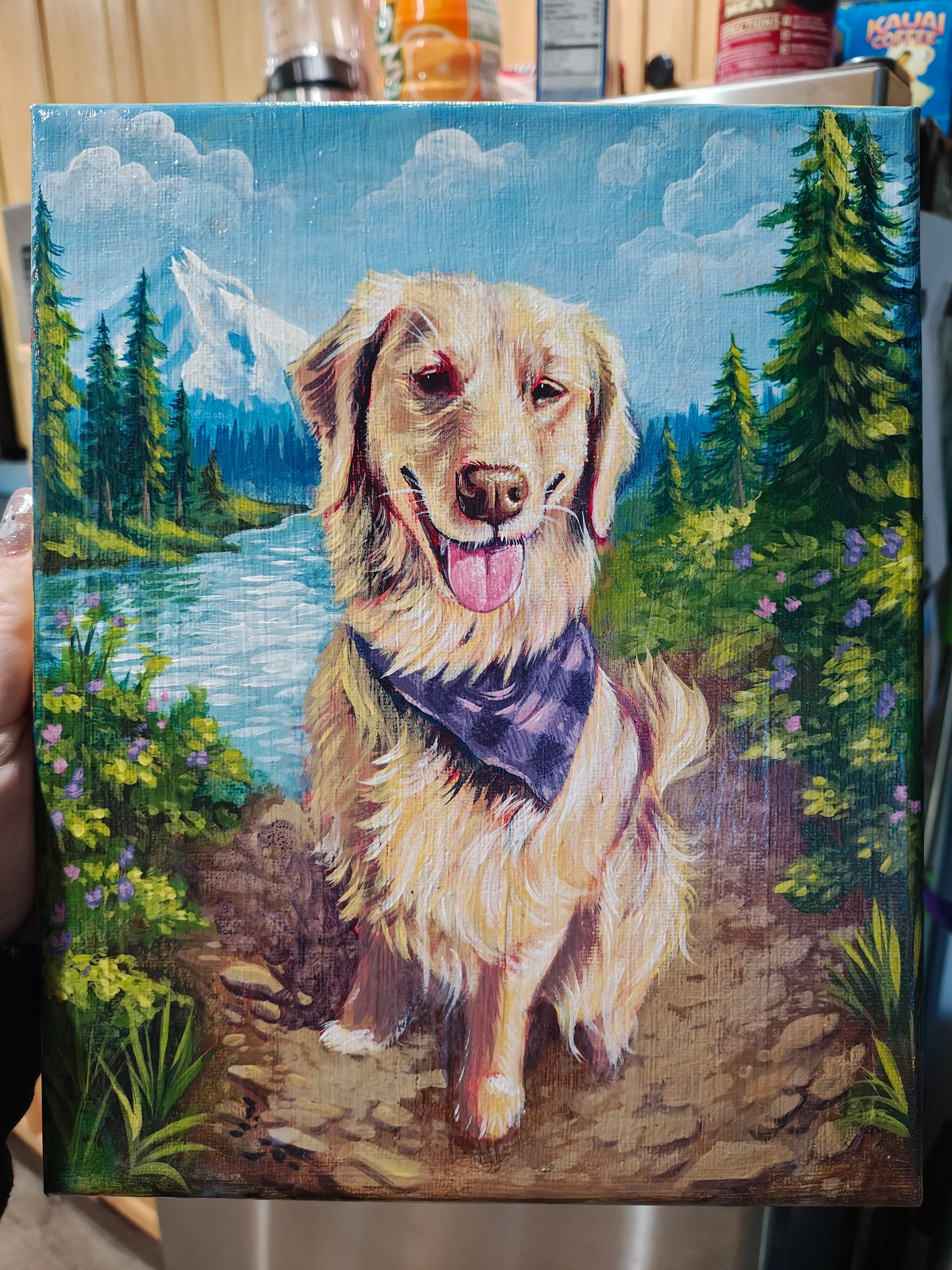 A custom dog portrait painting held in front of a kitchen background